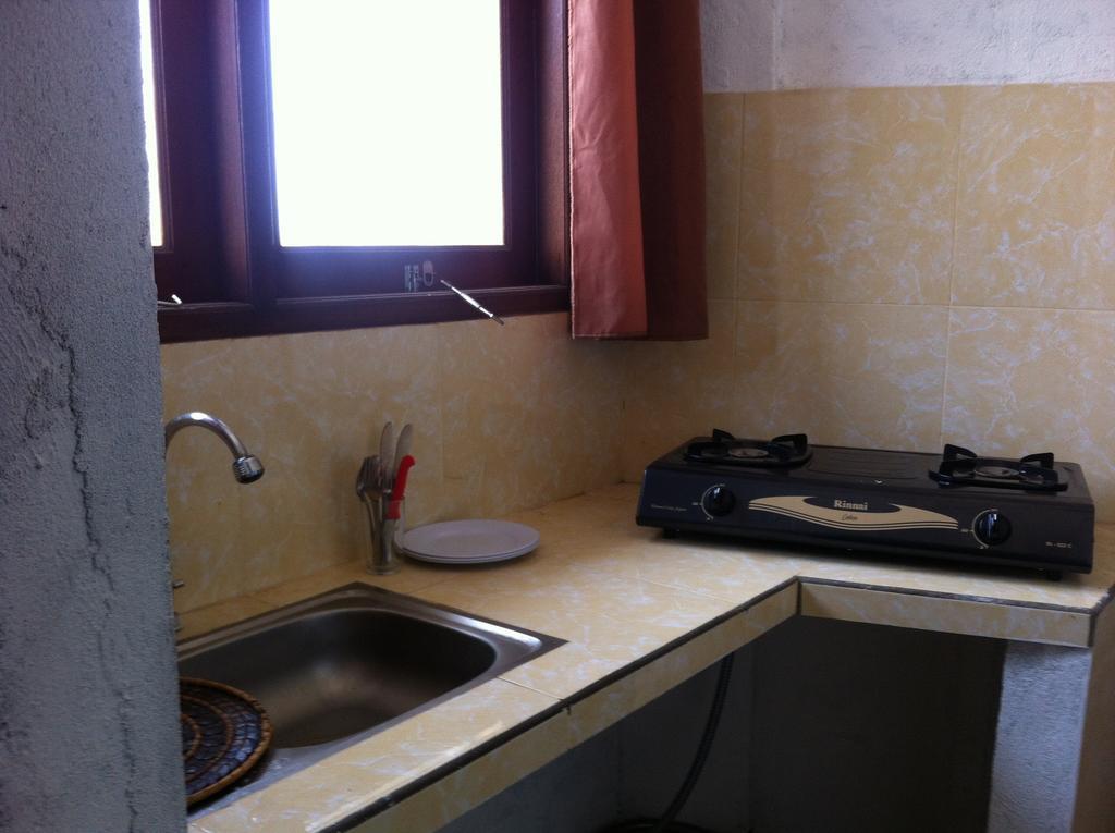 Amed Sari Beach Guesthouse Номер фото