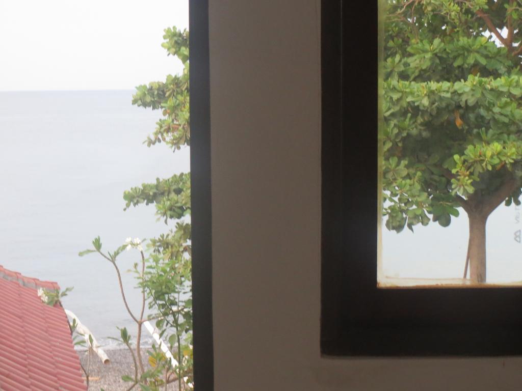 Amed Sari Beach Guesthouse Экстерьер фото