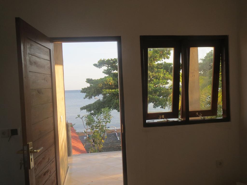 Amed Sari Beach Guesthouse Экстерьер фото