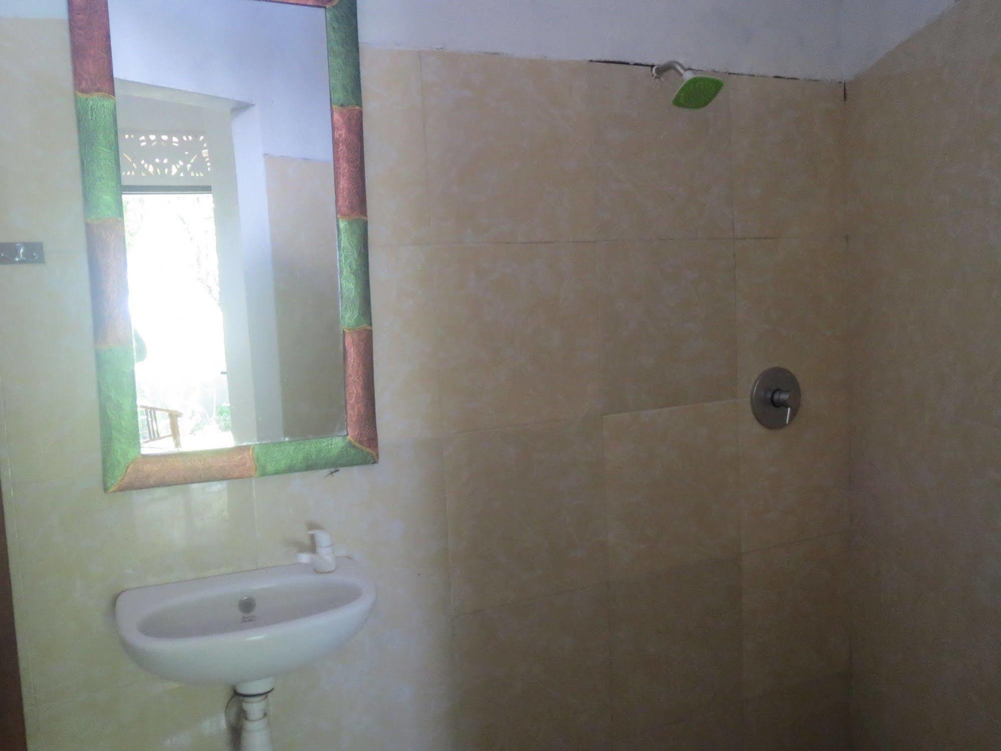 Amed Sari Beach Guesthouse Экстерьер фото
